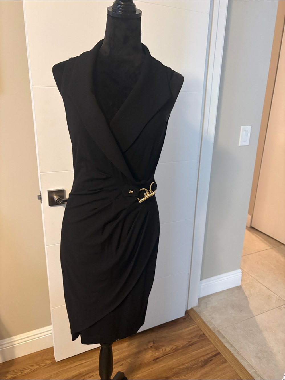 Gorgeous Cache Sleeveless Black Wrap Dress with Gold Accent